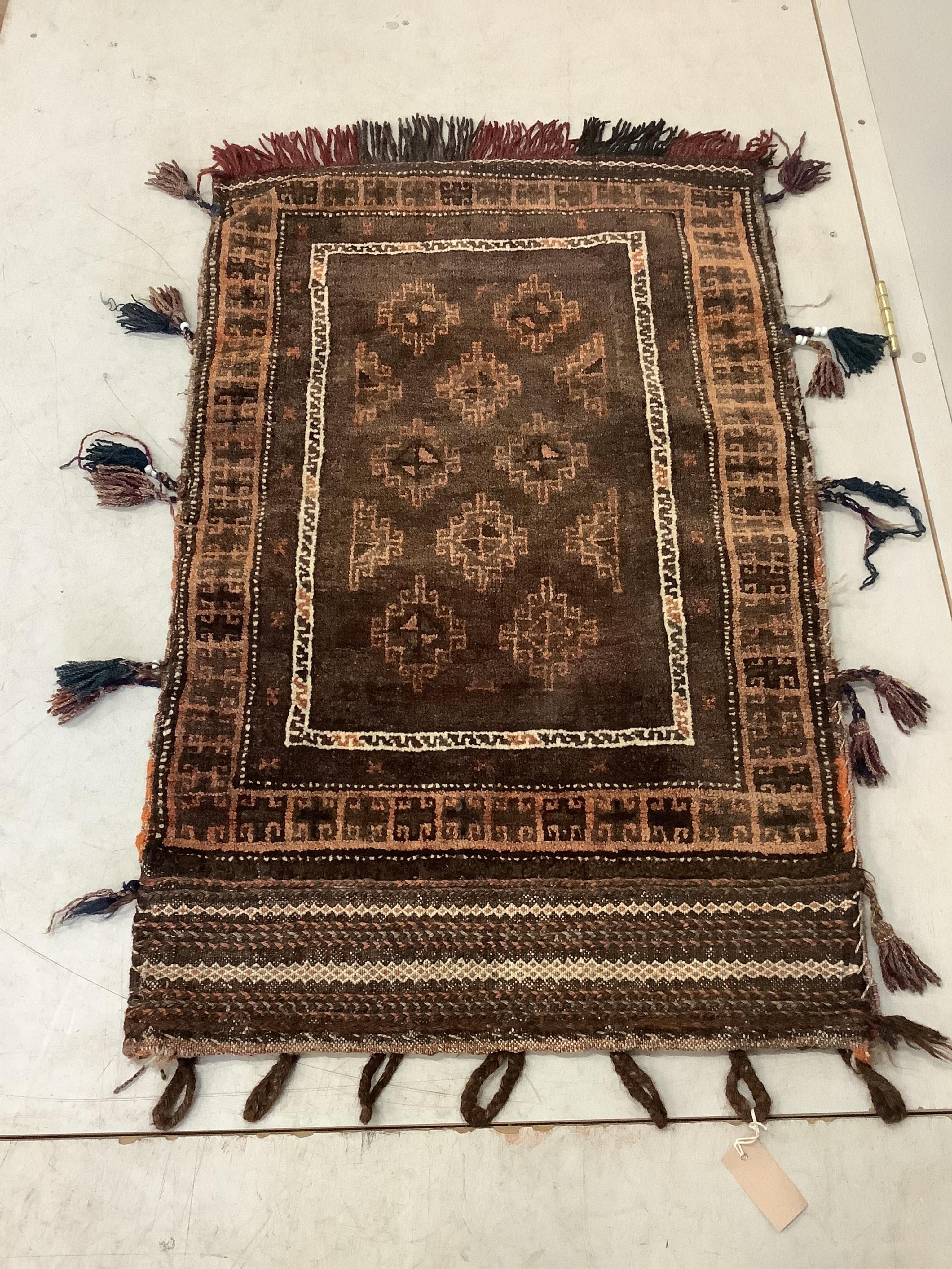 An Afghan flatweave salt bag, a double saddle bag and one other bag, largest approximately 120 x 80cm